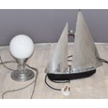 Art Deco chrome lamp formed as a sailing boat and a further lamp with stepped base, height of larger
