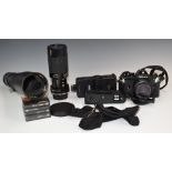 Nikon EM 35mm SLR camera outfit, including camera, fitted with 50mm 1:1.8 lens, Tamron 80-210mm 1: