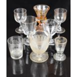 Eight 18thC and later drinking glasses including etched and gilded examples, rummers, flash overlaid