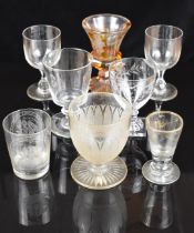 Eight 18thC and later drinking glasses including etched and gilded examples, rummers, flash overlaid