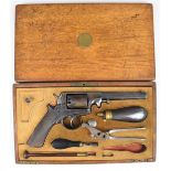 Adams .54 five-shot double action revolver with chequered wooden grips, line engraved frame