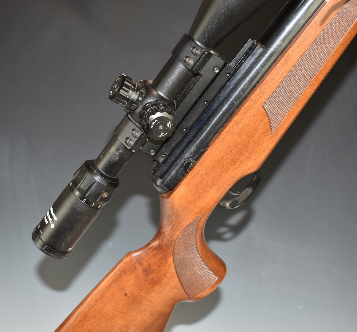 BSA .22 air rifle with chequered semi-pistol grip and forend, raised cheek piece, sound moderator