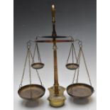 Spanish or similar double set of beam scales on brass base, height 38cm