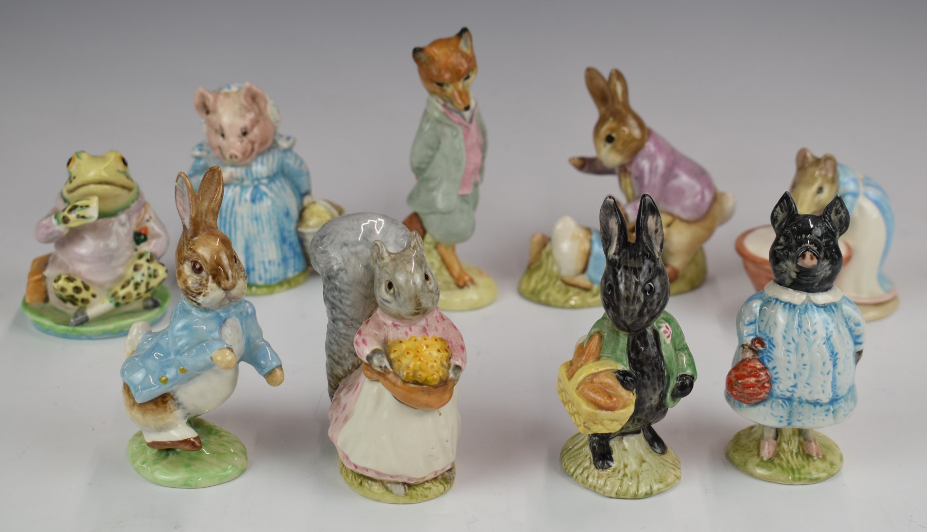 Nine Beswick Beatrix Potter figures to include Pig Wig and Little Black Rabbit, tallest 11cm