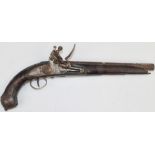 Eastern flintlock pistol with engraved lock, trigger guard and butt plate, carved grip and 10.5 inch