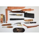 Five knives including an Ace-Pal-O space age survival knife and sheath, two hunting knives,