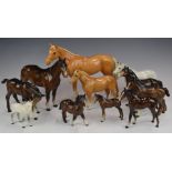 A collection of Beswick horses including palomino and grey colourways, H22cm