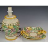Three pieces of Charlotte Rhead for Crown Ducal comprising a tubelined table lamp, H35cm and pair of