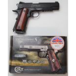 Umarex Colt 45 Government Model Special Combat .177 airsoft pistol with wooden grips, serial