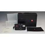 Leica C1 camera, with 38-105 lens, in original box with travel case, manual and warranty card,