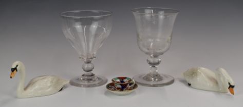 Two Georgian glass rummers, miniature cup and saucer and two Beswick swans, tallest 12cm