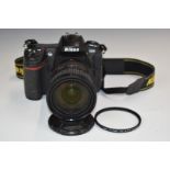 Nikon D300 digital SLR camera fitted with AF-S Nikkor 18-200mm 1:3.5-5.6 G ED DX lens