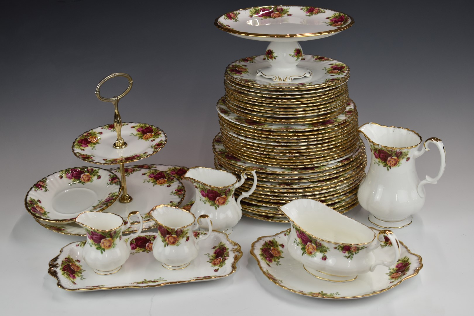 Approximately one hundred and four pieces of Royal Albert Old Country Roses dinner and teaware,