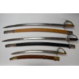 Three souvenir/display swords 'Made in India' with scabbards, longest blade 76cm. PLEASE NOTE ALL