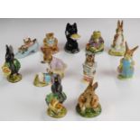 Eleven Beswick Beatrix Potter figures including Duchess With Pie and Mrs Flopsy Bunny BP2, tallest