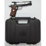Colt Special Combat .177 air pistol with faux wooden grips, serial number 13H39737, in hard carry