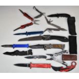 Collection of pocket knives and multitools including Silky Pocket Boy, Gerber, Smith & Wesson, 1st