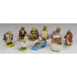 Nine Beswick Beatrix Potter figures to include Johnny Town Mouse With Bag and Chippy Hackee, tallest