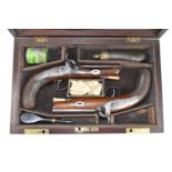 A pair of Harvey & Son of Exeter percussion hammer action pistols each with named and engraved lock,