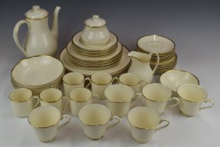 Approximately sixty pieces of Royal Doulton dinner and teaware decorated in the Heather pattern,