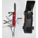 Victorinox officer's Swiss Army knife with fifteen blades/tools together with pack containing