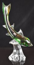 Rubelli Murano Italian glass sculpture depicting a dolphin riding a wave, with original label, 47.