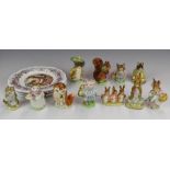 Eleven Beswick Beatrix Potter figures to include Little Pig Robinson and Mrs Tittlemouse, both