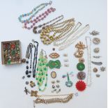 A collection of jewellery including Hollywood brooch, Art Deco buckle, Art Deco brooches, cameo