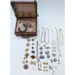 A collection of vintage brooches including Siam silver, filigree, diamanté necklace, pearl bracelet,