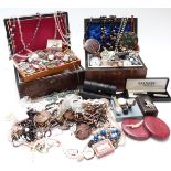 A collection of jewellery including Miracle brooch, beaded necklaces, enamel brooches, etc, in two