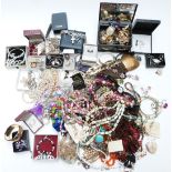 A collection of costume jewellery including silver earrings, silver necklaces and bracelets,