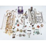 A collection of costume jewellery including rolled gold bangle, 9ct gold brooch (0.2g), a collection