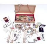 A collection of costume jewellery including vintage brooches, silver pocket watch, silver chain