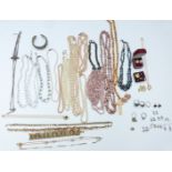 A collection of jewellery including Toledo bracelet, and necklaces including pearl, bone, Art Deco