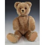 Schuco yes/no Teddy bear with label 'Harold Amer Teddy Bear', blonde mohair, shaved snout, straw