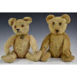 Two Steiff or similar Teddy bears both with blonde mohair, straw or similar filling, disc joints,