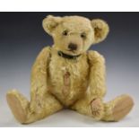 Farnell Teddy bear with blonde mohair, shaved snout, part straw filling, disc joints, cloth pads and