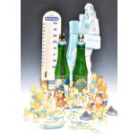 Large quantity of Babycham advertising figures including Carltonware and Pirelli Glass, point of