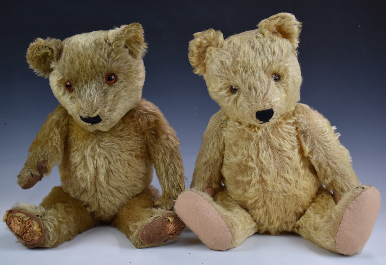 Two Steiff, Chad Valley or similar Teddy bears both with blonde mohair, growler, felt or cloth pads,