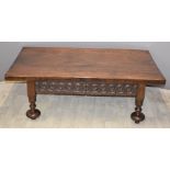 Heavy oak coffee table with carved decoration and two drawers, L144 x W85 x H44cm