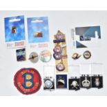 A collection of collectable badges including RAF, Bluebird Club, Postmen's Federation, Butlins