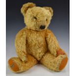 Merrythought Teddy bear with squeaker, golden mohair, soft filling, disc joints, felt pads, stitched