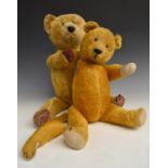 Two vintage Teddy bears one with growler, golden mohair, disc joints, straw filling, felt pads and