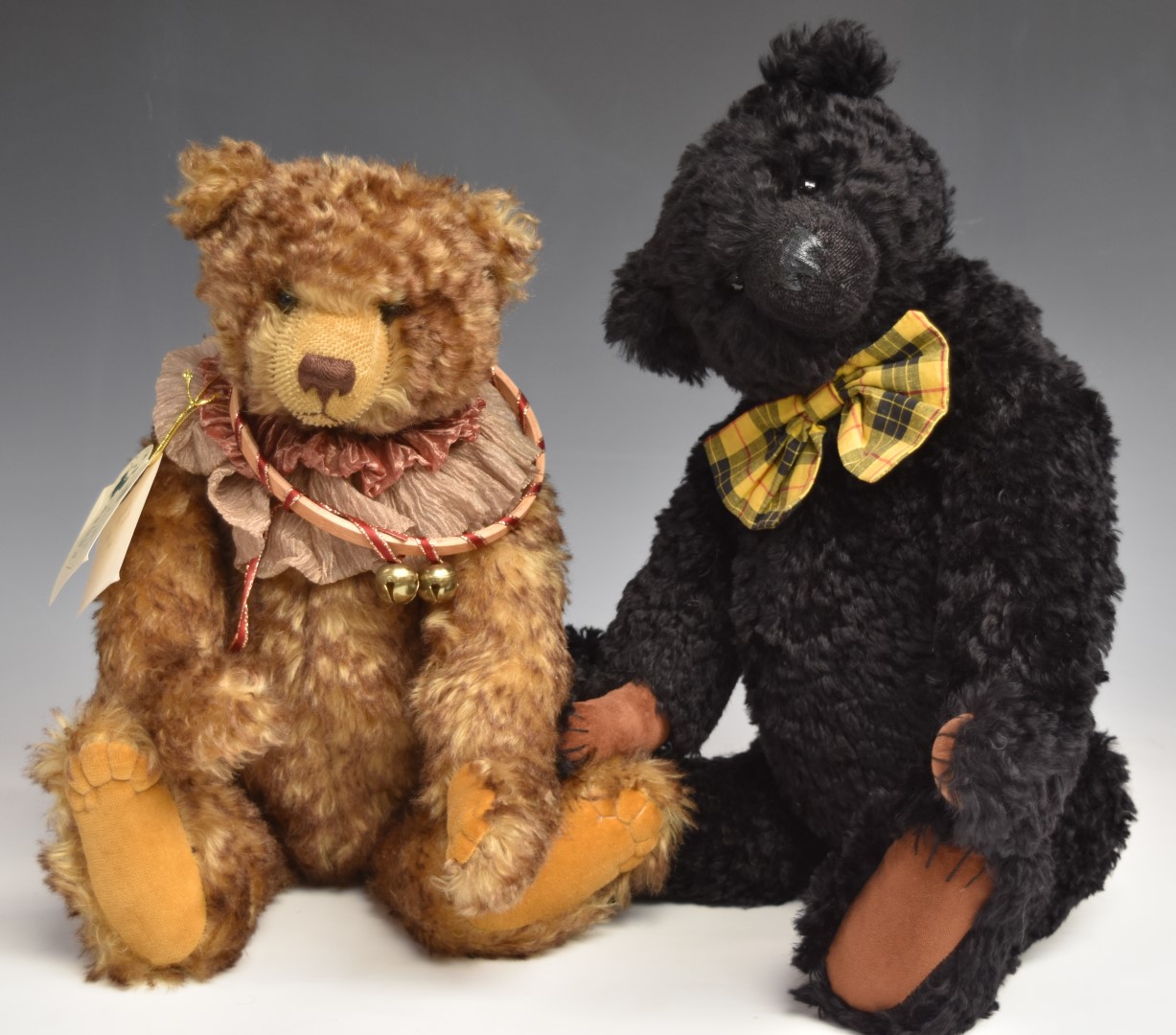 Two Pam Howells Bears That Are Special Teddy bears, one with black mohair, shaved snout, disc joints