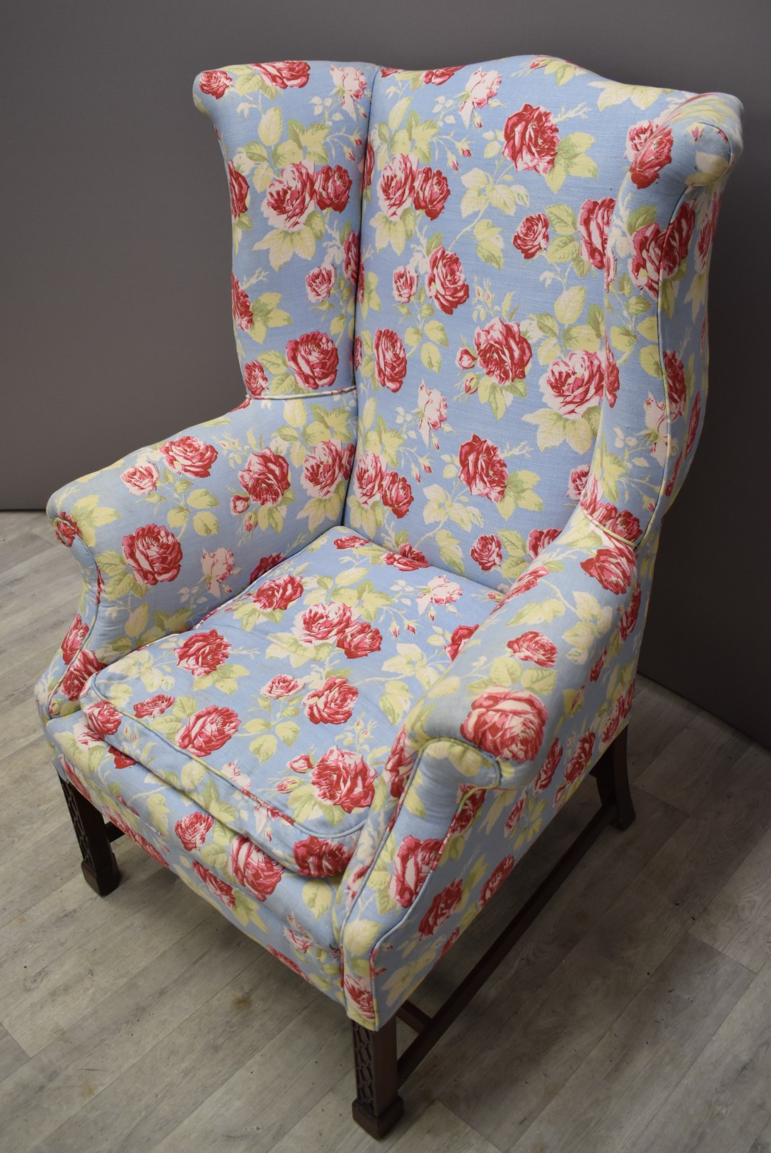 19thC wing back armchair with floral upholstery, raised on square legs with carved decoration, width - Image 2 of 2