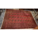 Wool rug with red ground, 217 x 288cm