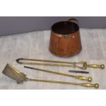Art Nouveau brass companion set with a two handled copper coal scuttle