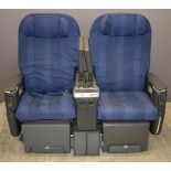 Pair of aeroplane seats with integral fold out screens, seat adjustments etc, width 136cm