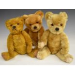 Three Chad Valley or similar Teddy bears each with growler, golden mohair, disc joints, straw or
