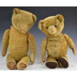 Two vintage Teddy bears, both with blonde mohair, disc joints, straw filling and felt or cloth pads,